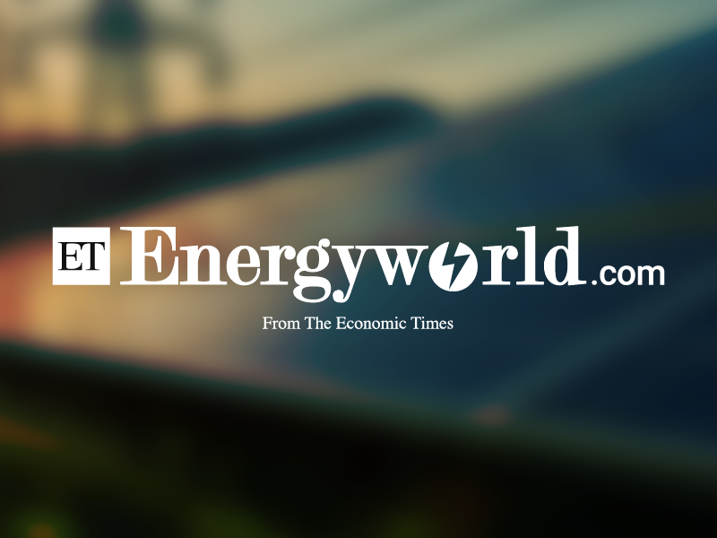 Economical Times Energy World logo over a blurred photo os photo voltaic panels